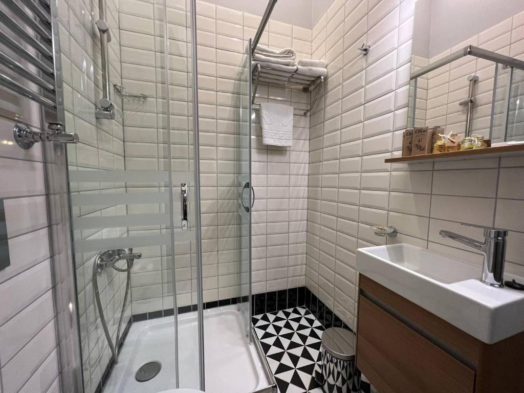 Ванная комната в Rafinn Hotel