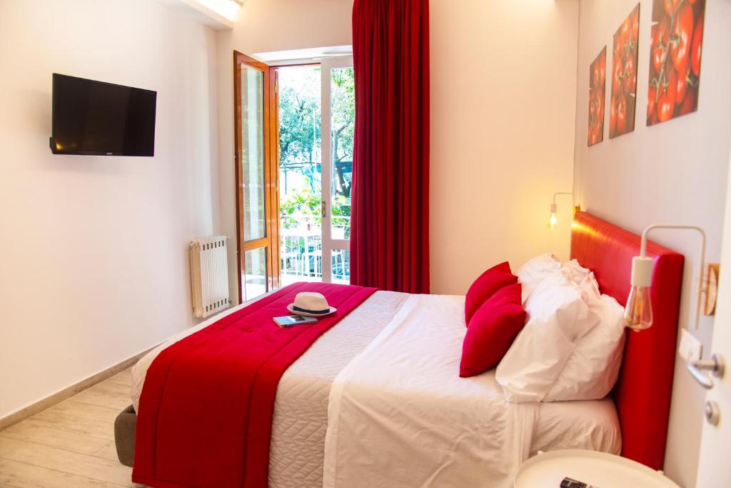 Postel nebo postele na pokoji v ubytování ON' MICHELE GUEST HOUSE