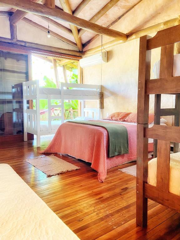 Cama ou camas em um quarto em Casa da Arquiteta Guest House