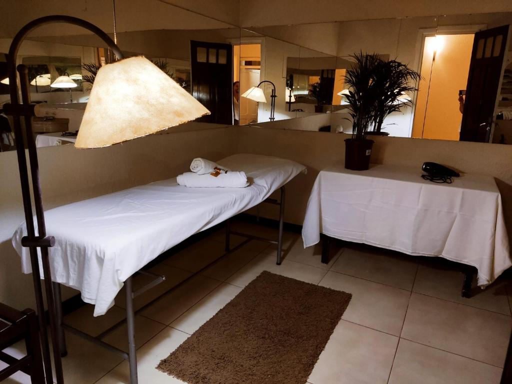 Postel nebo postele na pokoji v ubytování Hotel Mesón Do Vento
