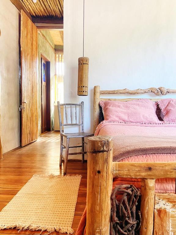 Cama ou camas em um quarto em Casa da Arquiteta Guest House