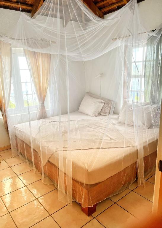 Postel nebo postele na pokoji v ubytování Villa Caribbean Dream