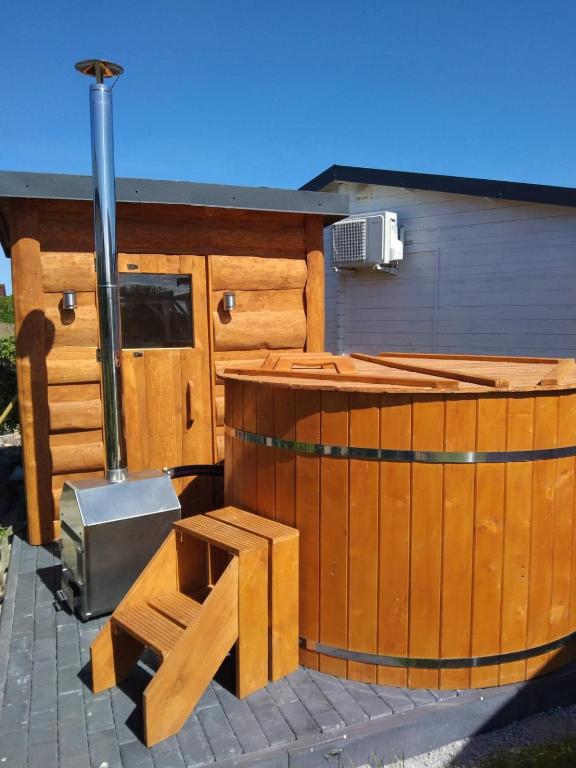 Fotografie z fotogalerie ubytování Domki LA MER z własnymi ogródkami- Balia z jacuzzi ,sauna ,rowery, klimatyzacja v destinaci Ustka