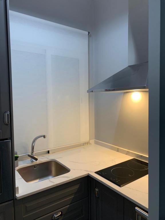 Kuchyň nebo kuchyňský kout v ubytování Kentia Rooms Torremolinos