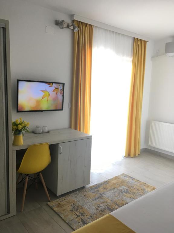 TV a/nebo společenská místnost v ubytování Vila Allure