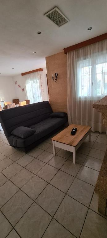 Posedenie v ubytovaní Villa individuelle 8 personnes clim, internet