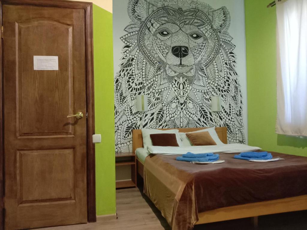 Postel nebo postele na pokoji v ubytování Mini-Hotel Ocean