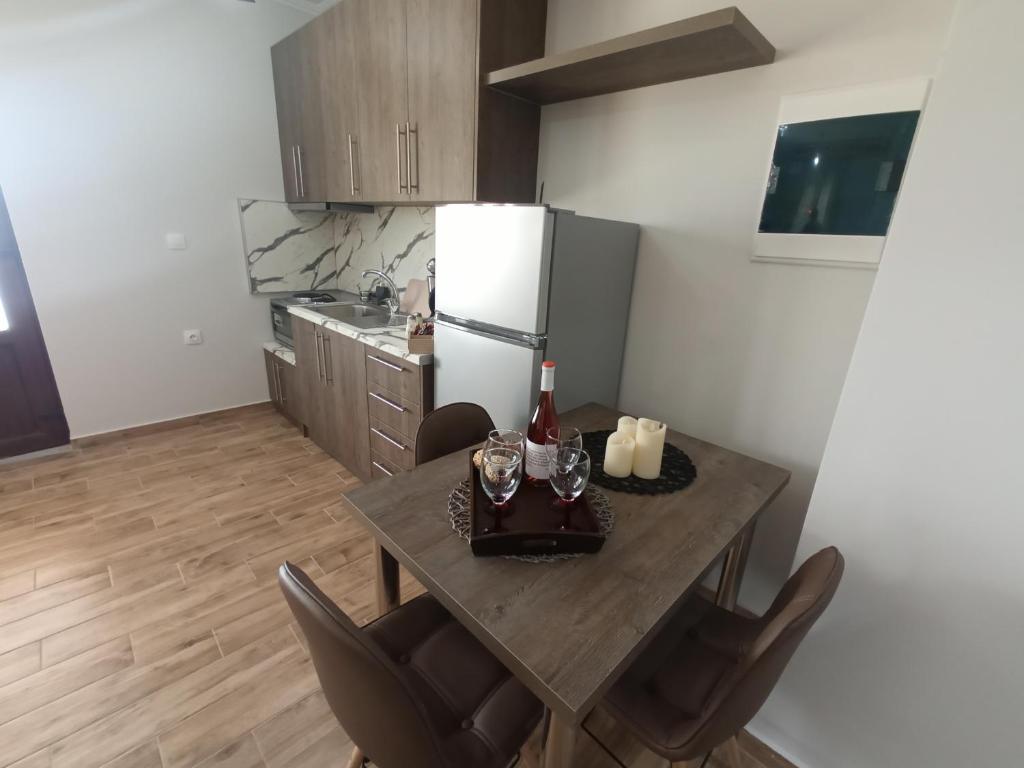 Kuchyň nebo kuchyňský kout v ubytování MELENIOS HOUSES