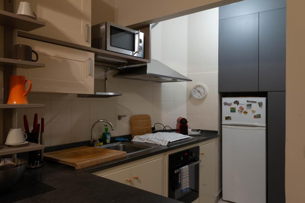 Kuchyň nebo kuchyňský kout v ubytování Palazzo Scammacca