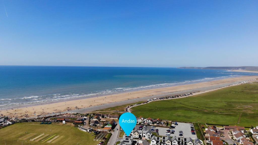 an aerial view of a beach and the ocean at Footsteps to the beach, Seaviews & Beautiful Sunsets in Westward Ho