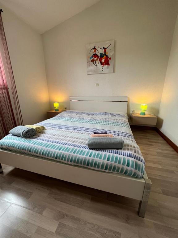 Postel nebo postele na pokoji v ubytování Villa Viktorija
