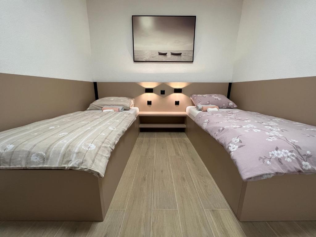 Postel nebo postele na pokoji v ubytování Villa Viktorija
