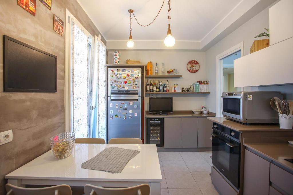 Kuchyň nebo kuchyňský kout v ubytování Maison Emozioni