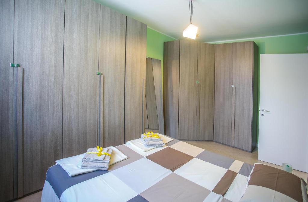 Postel nebo postele na pokoji v ubytování Maison Emozioni