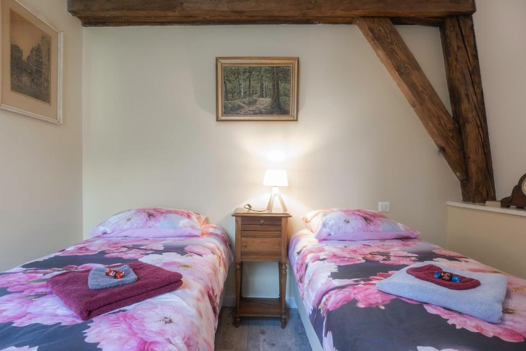 Postel nebo postele na pokoji v ubytování Le Pont du Roy