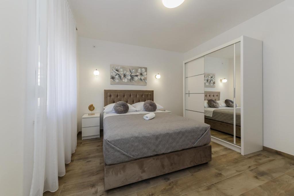 Posteľ alebo postele v izbe v ubytovaní Luxury Apartment Maris