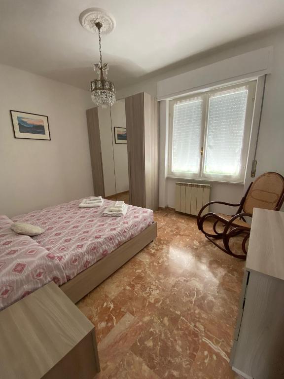 Łóżko lub łóżka w pokoju w obiekcie Villa Maremonti - con 3 piscine