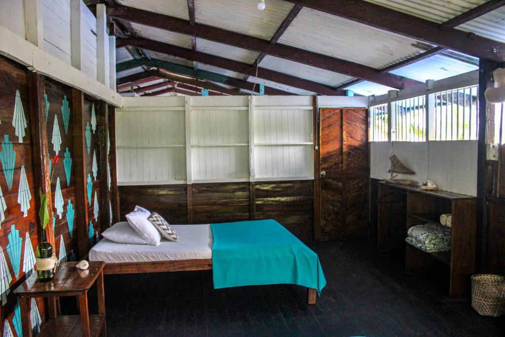 Postel nebo postele na pokoji v ubytování Refugio Mr Jerry Eco House