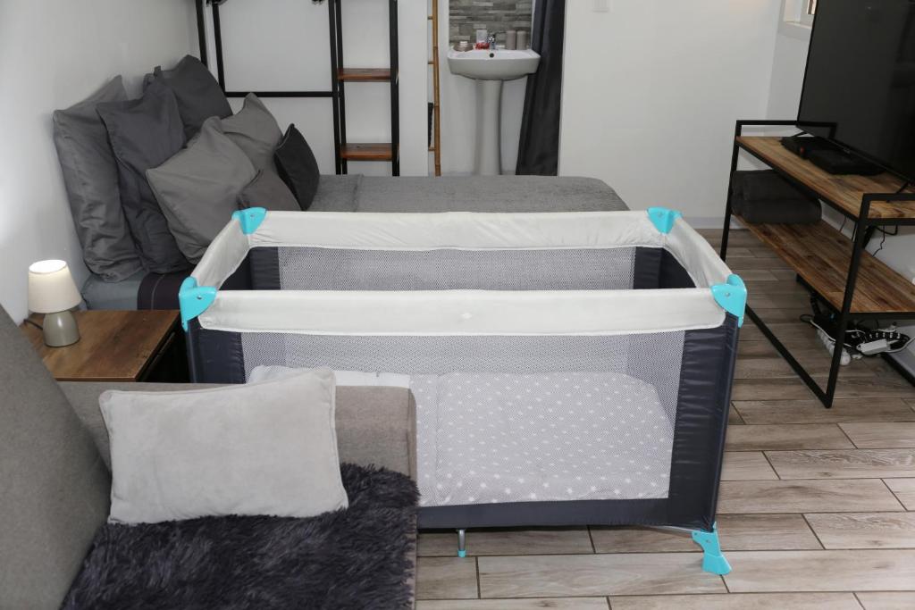 Postel nebo postele na pokoji v ubytování Bungalow Harmony