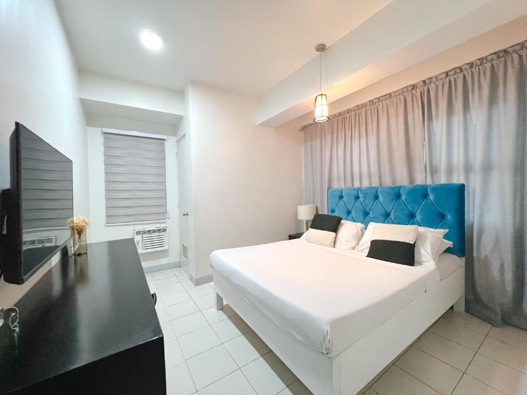 Кровать или кровати в номере LuxeCara Guest House