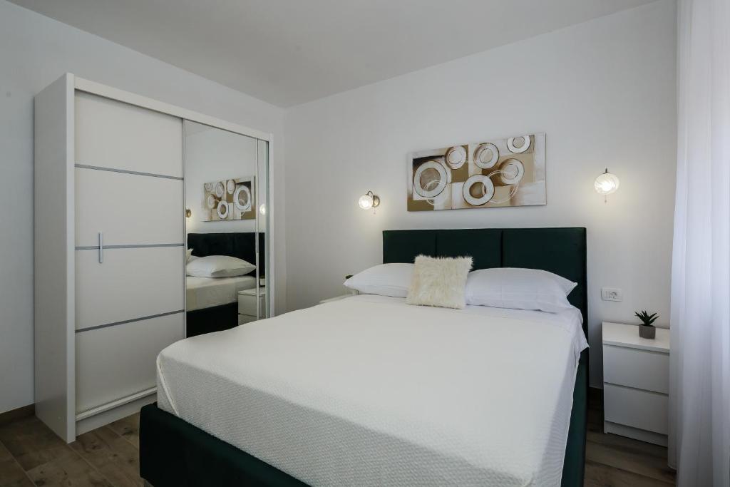 Posteľ alebo postele v izbe v ubytovaní Luxury Apartment Maris