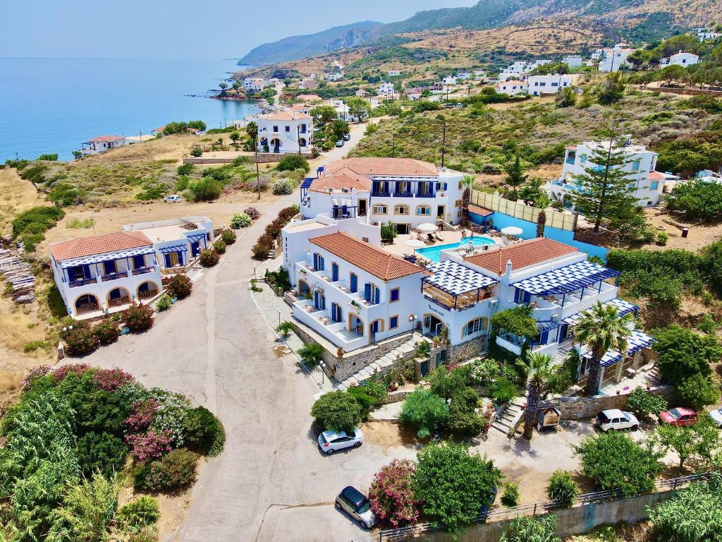 an aerial view of a large house on a hill at Venardos Hotel in Agia Pelagia