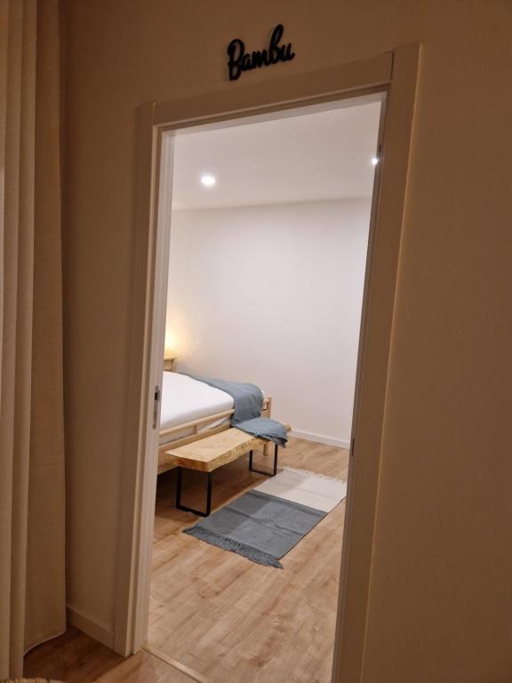 Postel nebo postele na pokoji v ubytování Mil e Uma Noites