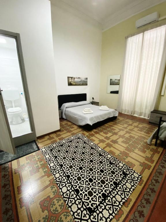 Posteľ alebo postele v izbe v ubytovaní Nel cuore Di Napoli