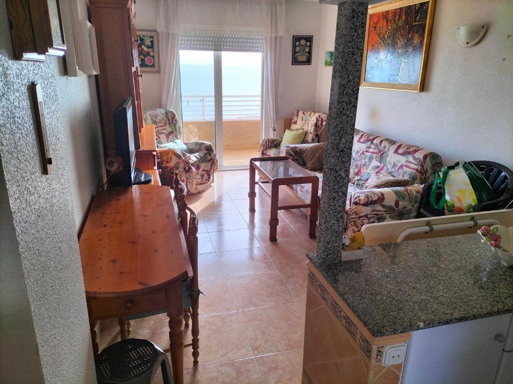 Televízia a/alebo spoločenská miestnosť v ubytovaní LOMAS DEL MAR TORREVIEJA SOBRE EL MEDITERRÁNEO