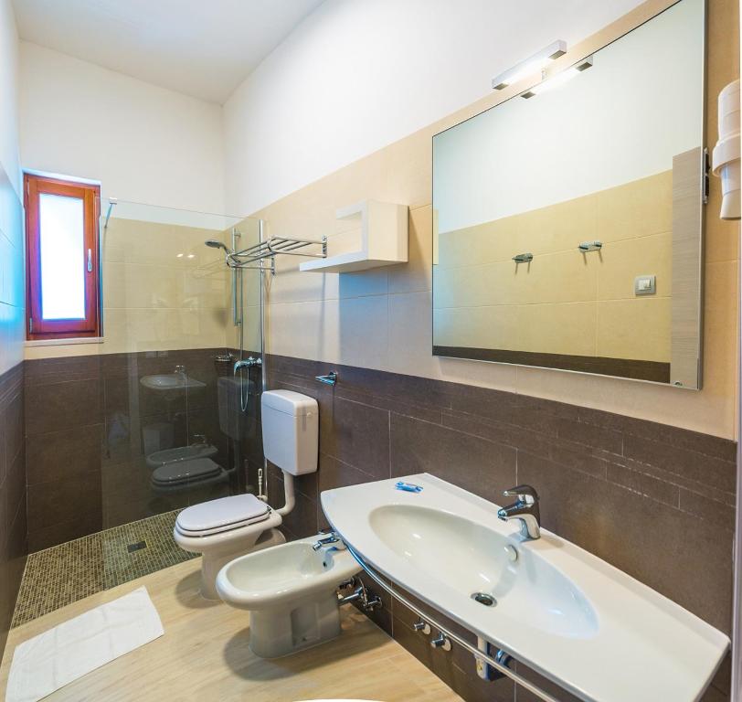 Ванная комната в Villaggio Mare Blu