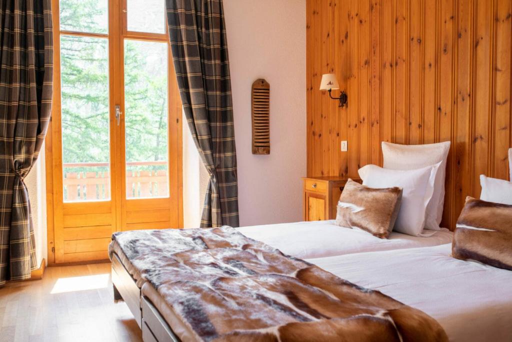 Postel nebo postele na pokoji v ubytování Grand Hôtel & Kurhaus