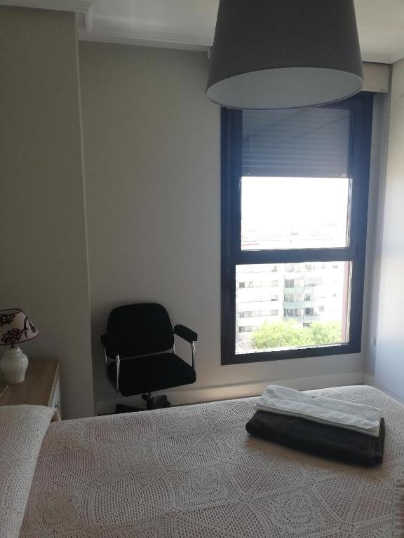 Postel nebo postele na pokoji v ubytování Apartamento Teatinos Málaga