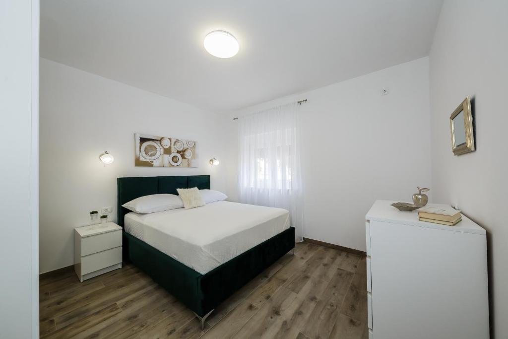Posteľ alebo postele v izbe v ubytovaní Luxury Apartment Maris