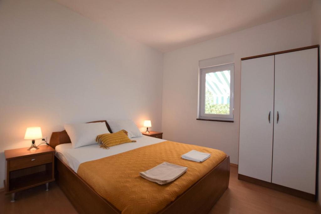 Łóżko lub łóżka w pokoju w obiekcie Holiday Home Movica