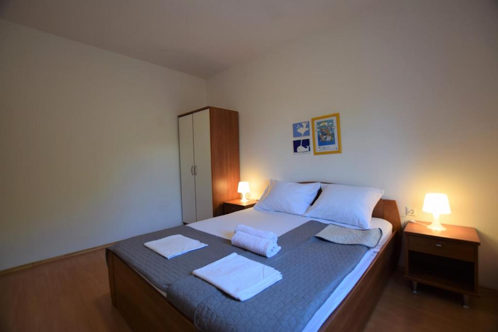 Łóżko lub łóżka w pokoju w obiekcie Holiday Home Movica