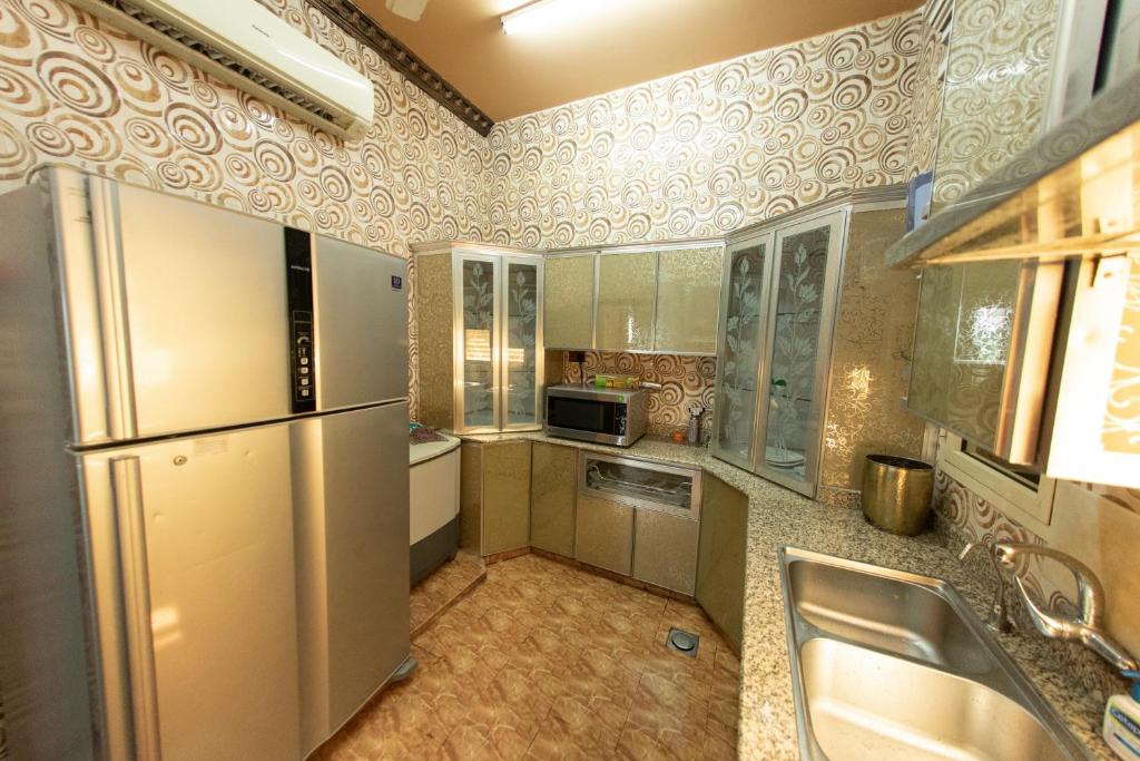 Kuchyň nebo kuchyňský kout v ubytování Nhar Accommodation House