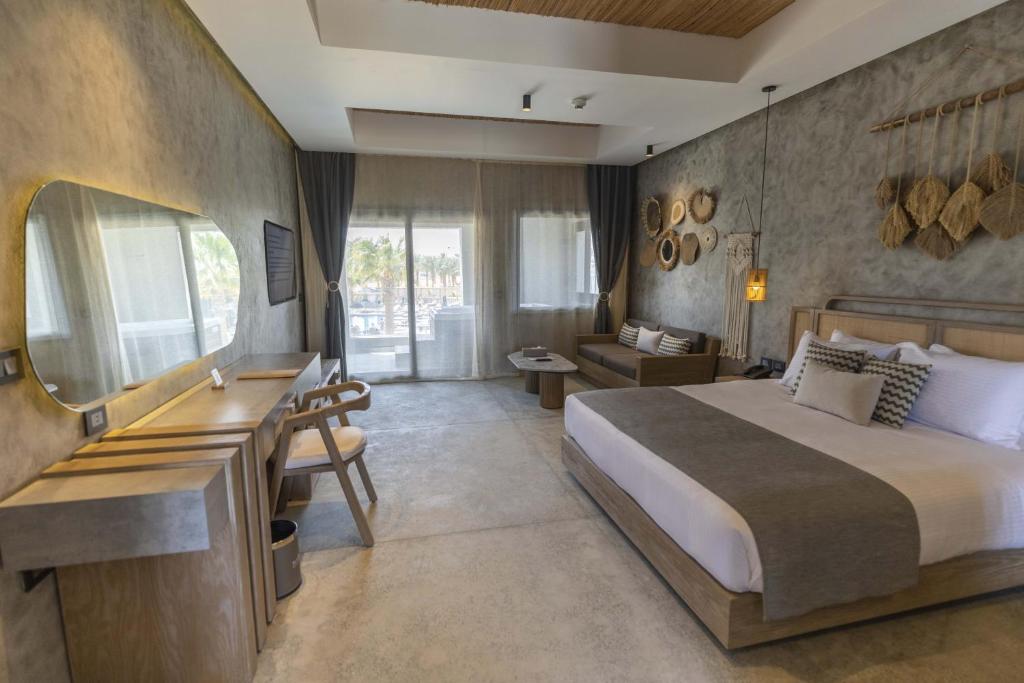 Postel nebo postele na pokoji v ubytování Sunrise Tucana Resort Grand Select