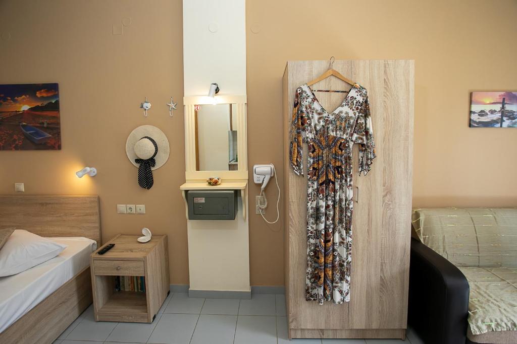 Postel nebo postele na pokoji v ubytování Rania Studios