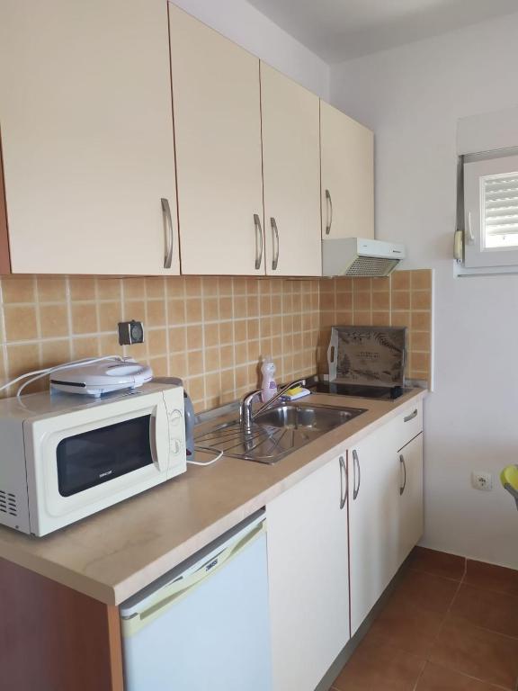 Kuchyňa alebo kuchynka v ubytovaní Apartments Bralic
