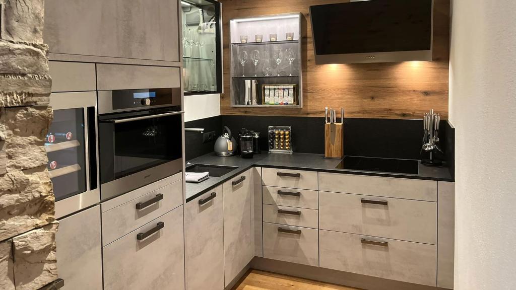Kuchyň nebo kuchyňský kout v ubytování Landhaus Mader Hintertux