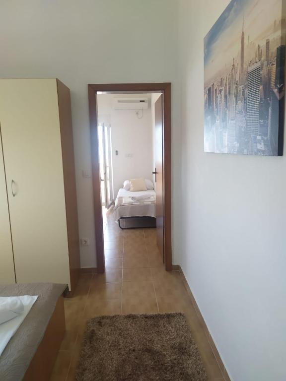 Posteľ alebo postele v izbe v ubytovaní Apartments Bralic