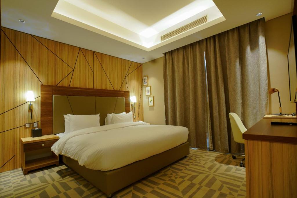 Letto o letti in una camera di Al Aseel Hotel