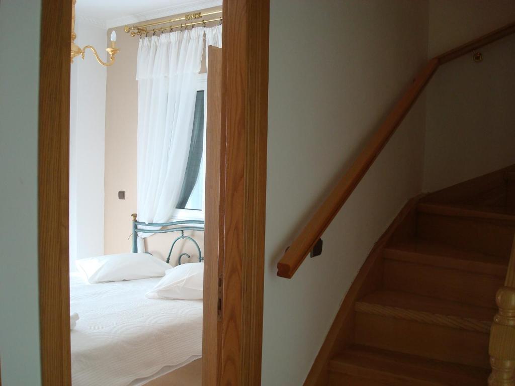 Cama ou camas em um quarto em Merlot Village Rental Apartments