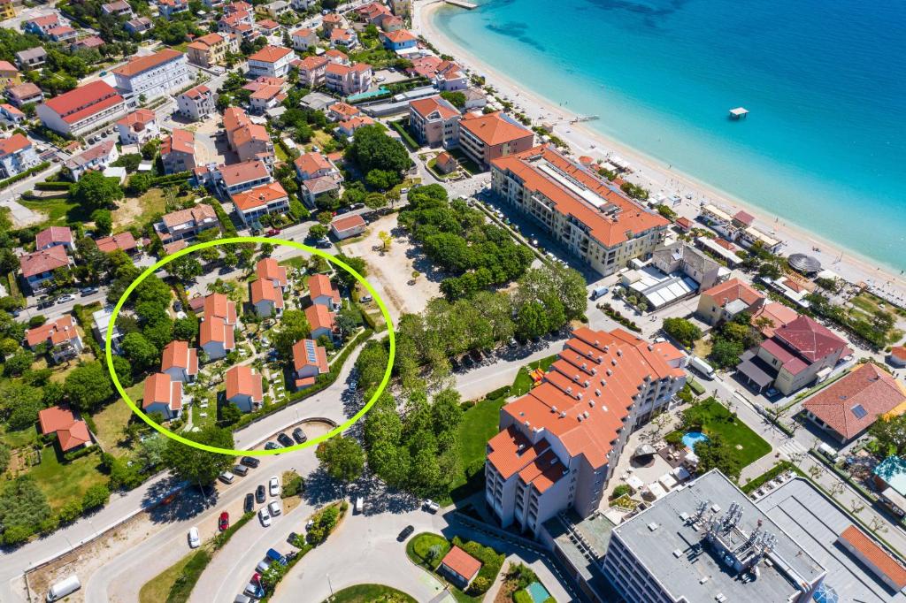 an aerial view of a city next to the beach at Villas Corinthia in Baška