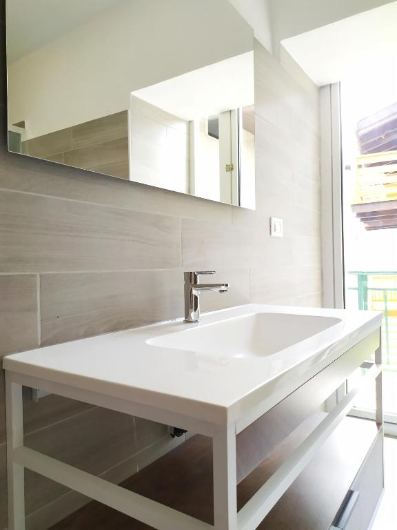 Kúpeľňa v ubytovaní Levico Al Corso Apartments
