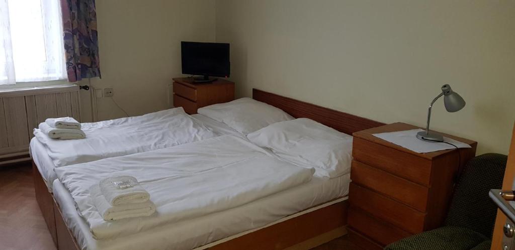 Postel nebo postele na pokoji v ubytování THE Z ACCOMMODATION