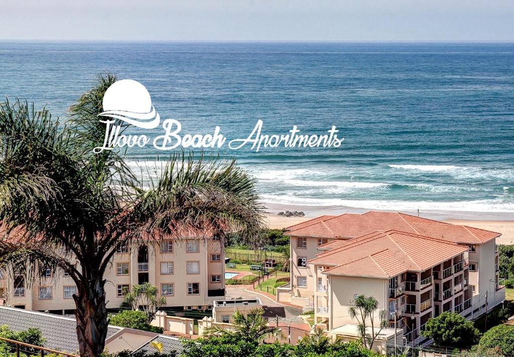 a view of the beach from the balcony of a resort at Illovo Beach Apartments at La Mer in Amanzimtoti