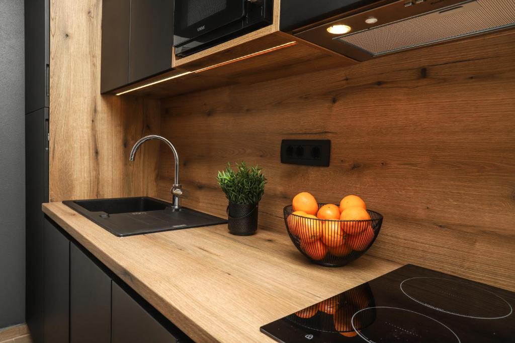 Kuchyň nebo kuchyňský kout v ubytování Apartments Residence Radovan 1