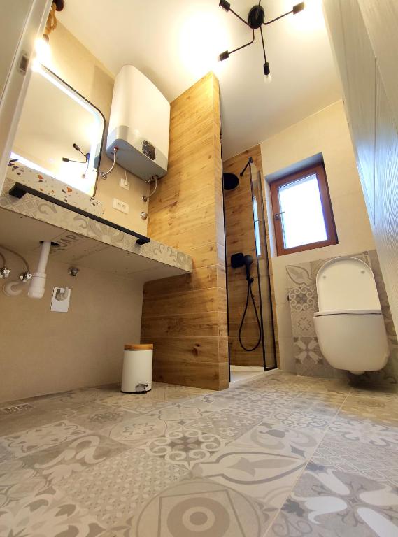 Koupelna v ubytování Aldos House