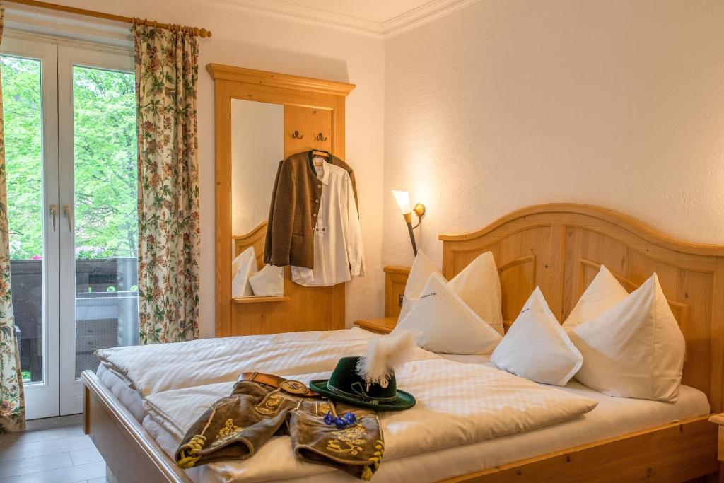 Postel nebo postele na pokoji v ubytování Landhaus Ertle